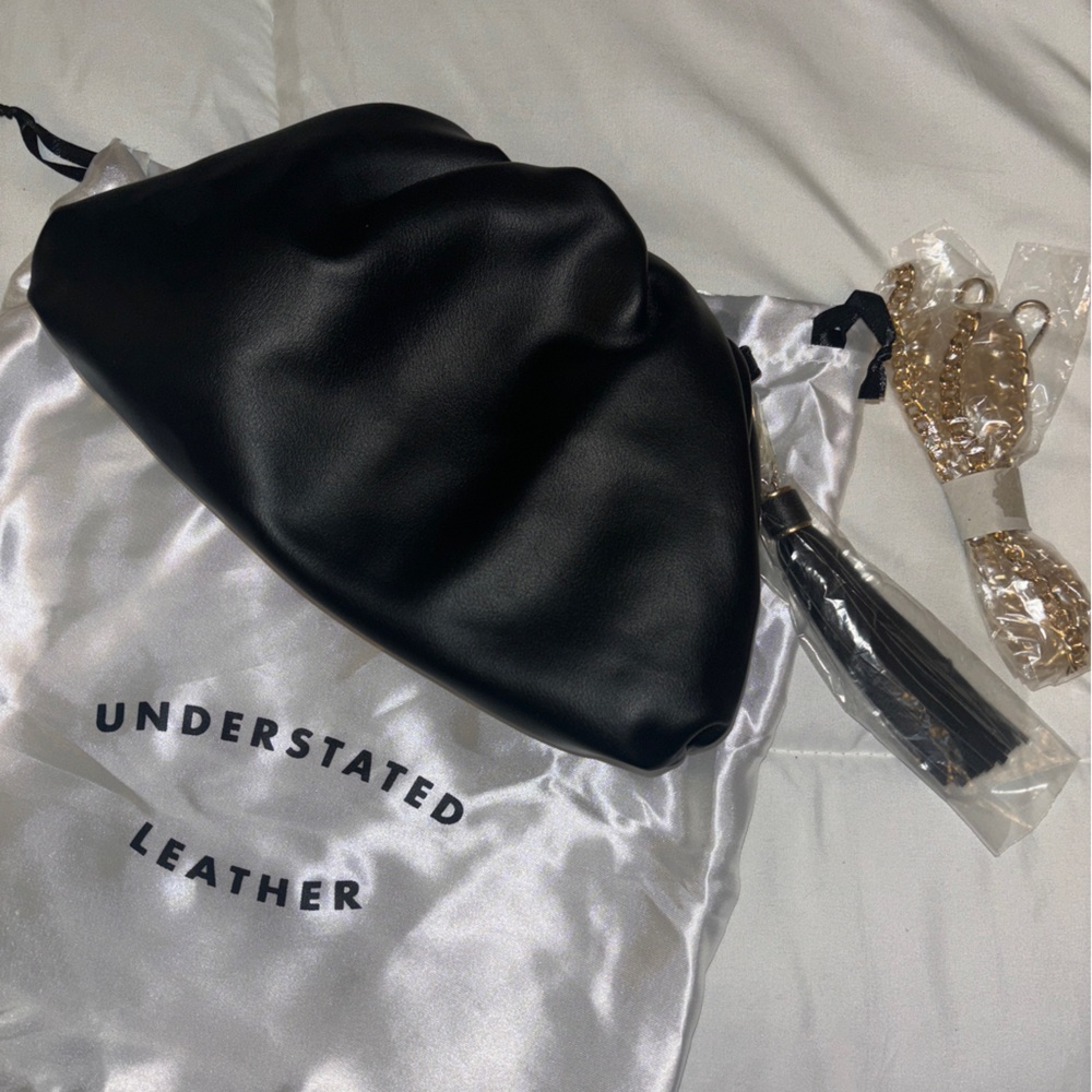 Understated leather clutch bag